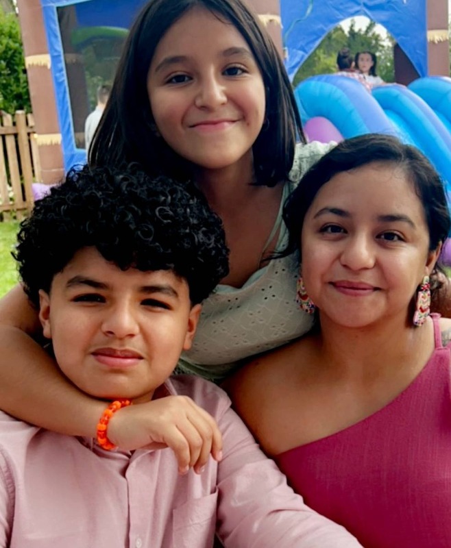 A Bayshore family of 3 enjoys time together at an end-of-summer community event