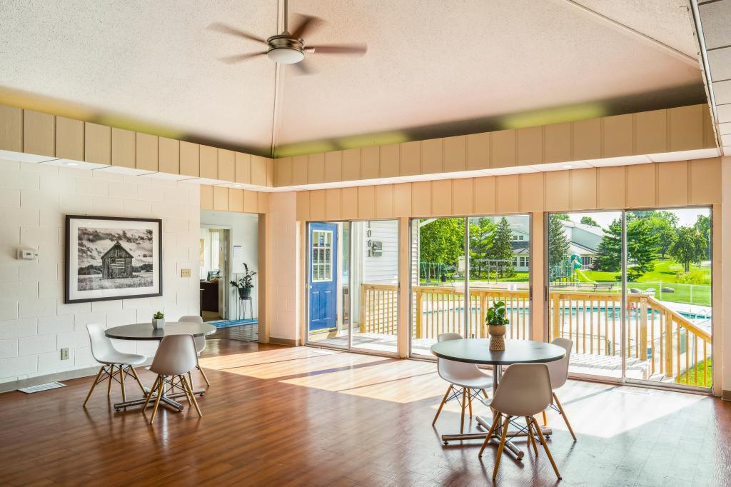 Discover the Best Manufactured Home Communities near Grand Rapids - Appletree%20Estates%20community%20clubhouse%20with%20pool%20side%20view%20in%20Walker%20MI