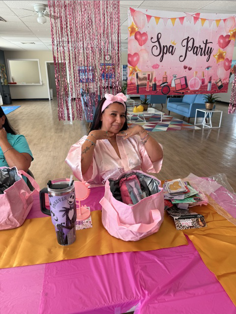 A Bayshore mom strikes a pose at a Mother's Day Spa Party community event