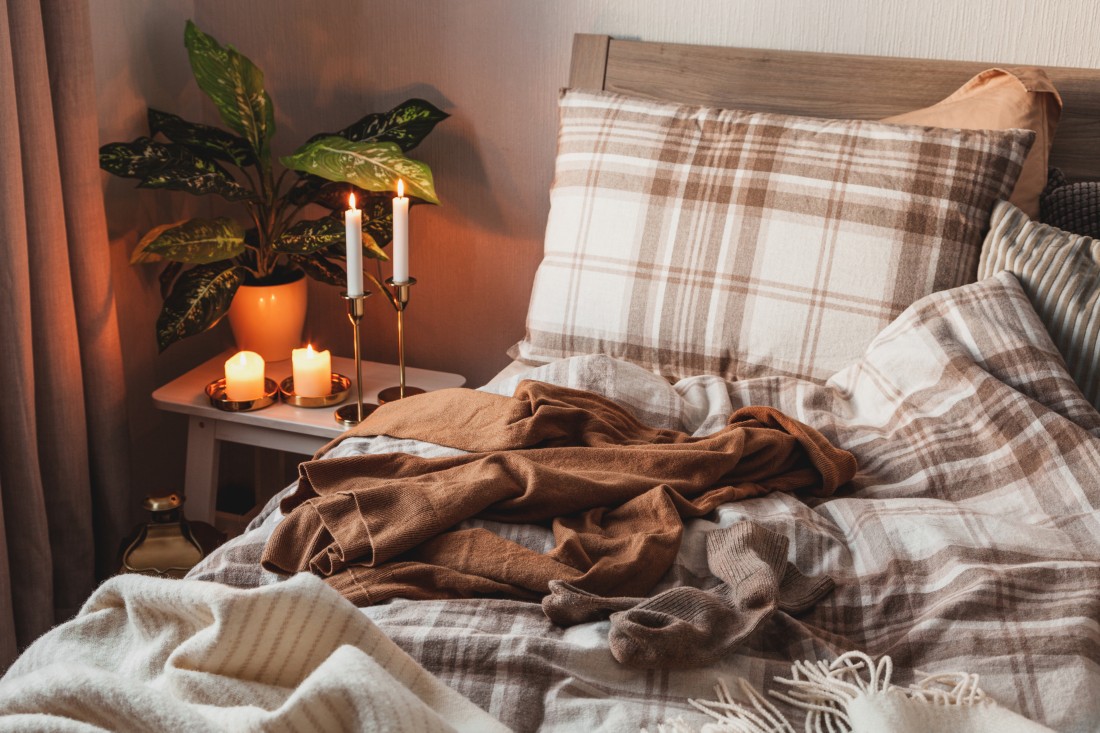 A cozy fall bedroom with flannel sheets