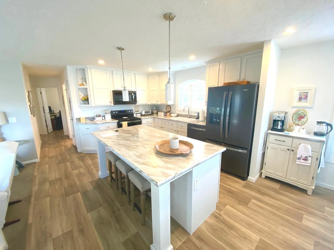 Kitchen and living area of a new Bayshore manufactured home